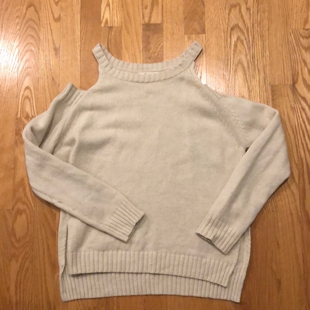 Beige knit sweater with cut out shoulders